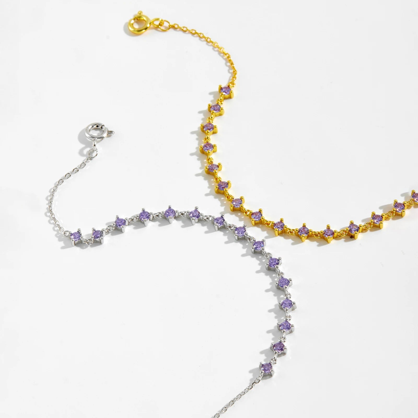 Enhance your style and express your faith with the Lilac Crystal Bracelet. Made with 925 sterling silver and adorned with sparkling Cubic Zirconia stones, this delicate bracelet features a cross design symbolizing love, faith, and unity. Its adjustable chain allows for a perfect fit, making it a meaningful addition to any outfit.

Specifications

Materials: 925 Sterling Silver
Bracelet Thickness: 3mm
Bracelet Type: Chain &amp; Link Bracelets, Chain &amp; Zircon Bracelets
Diameter: 2.5mm
Length (Size): 18cm 