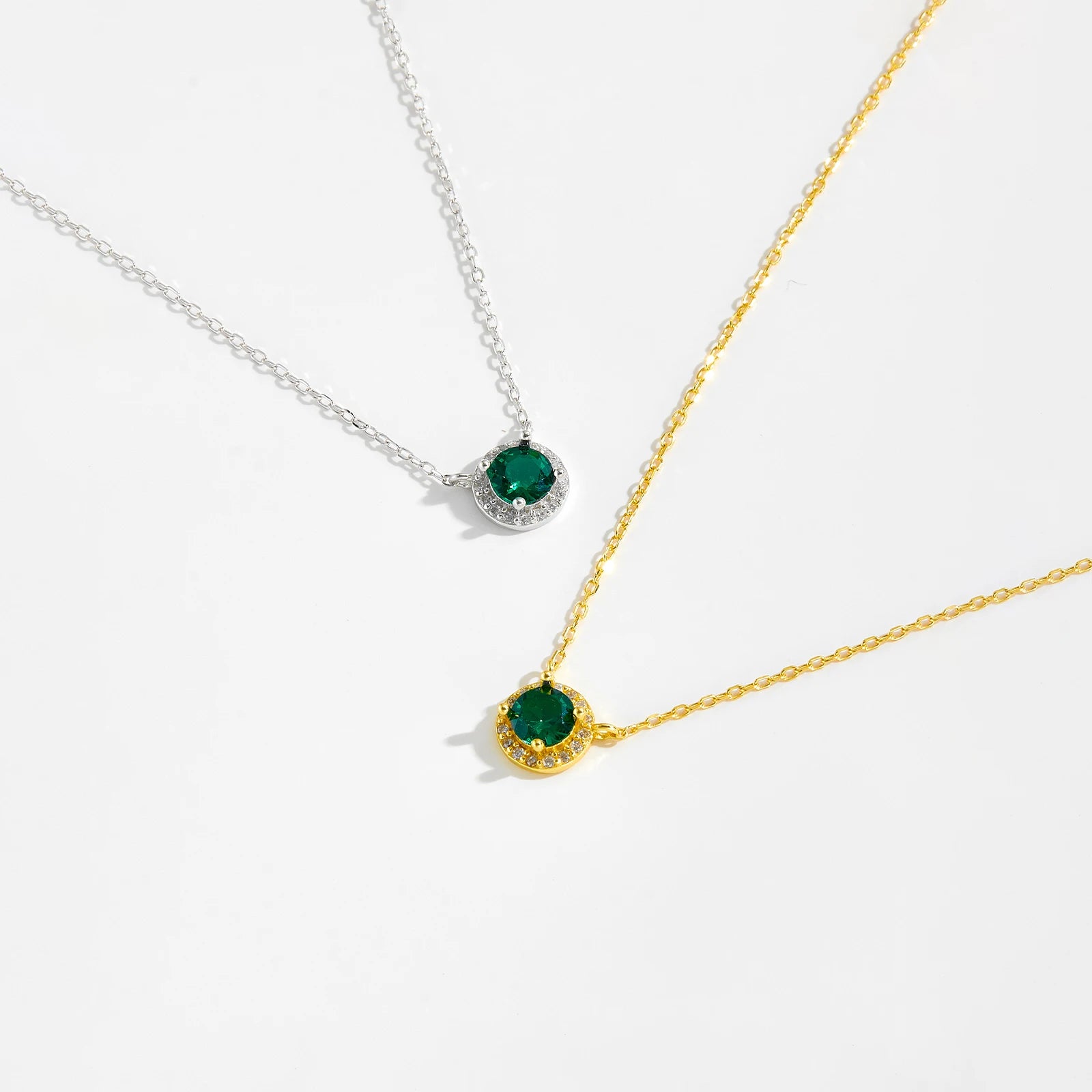 Green Gemstone Necklace, a stunning blend of elegance and sophistication. Crafted from 925 sterling silver, this pure silver necklace features a mesmerizing green stone, radiating a vibrant and timeless charm. The carefully set green garnet adds a touch of luxury, making it a perfect statement piece for any occasion.

Designed with intricate detailing, this necklace includes a delicate chain pendant, offering a refined and graceful look. Whether worn alone or layered with other choker pendants.