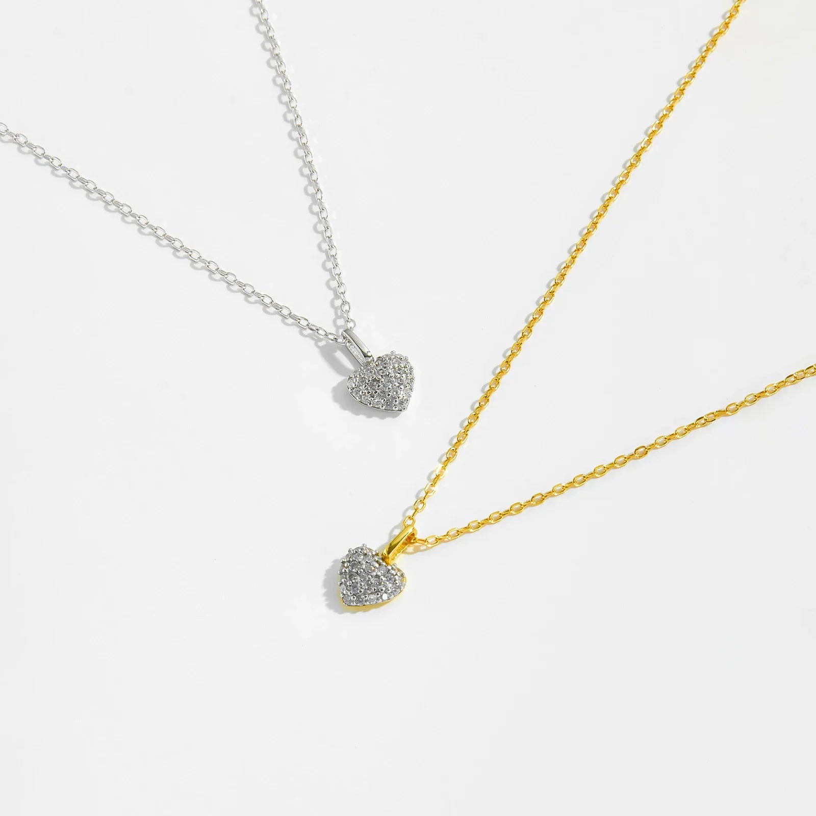 This sterling heart necklace is crafted from high-quality 925 in jewelry pure silver necklace, offering a timeless and elegant design. The delicate circle necklace chain pendants enhance its beauty, making it perfect for everyday wear or special occasions. Pair it effortlessly with bracelet jewelry and ear jewellery for a complete and sophisticated look. The charming choker pendant design adds a modern yet classic touch. If you're searching for silver jewelry that exudes elegance and durability.