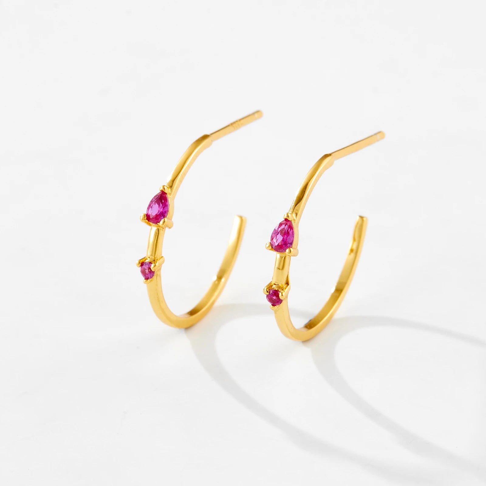 Crafted from 925 Sterling Silver with 14kt Gold Plating, these Blush Hoop Earrings feature Pink Cubic Zirconia stones for a subtle sparkle and touch of elegance. At 15mm diameter, they are perfect for everyday wear or special occasions. Comfortable and stylish, they make a perfect gift or addition to your accessory collection.

Specifications

Material: 925 Sterling Silver with 14kt Gold Plating
Stone Type: AAA Cubic Zirconia
Stone Size: 3.5mm
Earring Type: Hoop Earrings
Diameter: 15mm
Shape: Hoop
Stone Siz