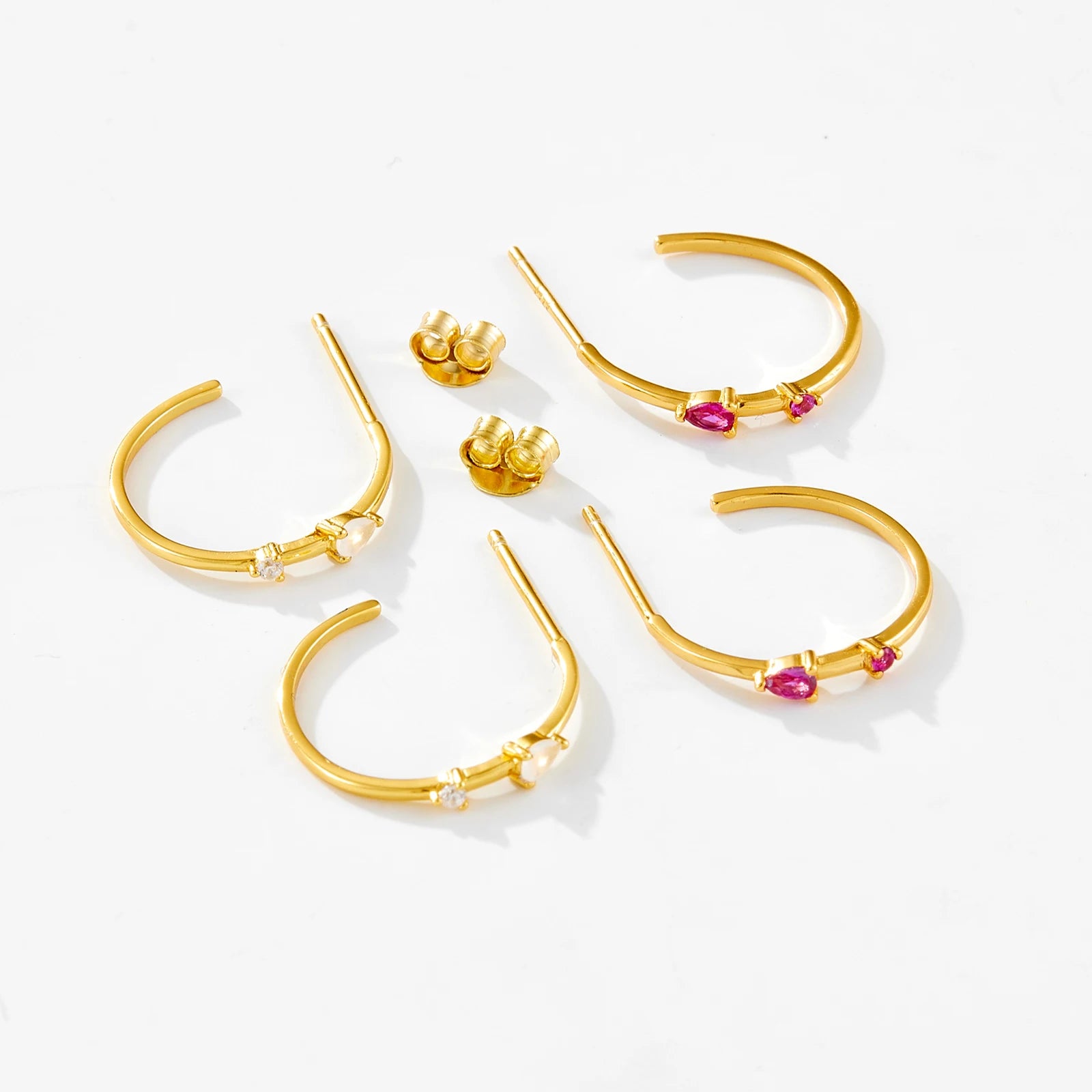 Crafted from 925 Sterling Silver with 14kt Gold Plating, these Blush Hoop Earrings feature Pink Cubic Zirconia stones for a subtle sparkle and touch of elegance. At 15mm diameter, they are perfect for everyday wear or special occasions. Comfortable and stylish, they make a perfect gift or addition to your accessory collection.

Specifications

Material: 925 Sterling Silver with 14kt Gold Plating
Stone Type: AAA Cubic Zirconia
Stone Size: 3.5mm
Earring Type: Hoop Earrings
Diameter: 15mm
Shape: Hoop
Stone Siz