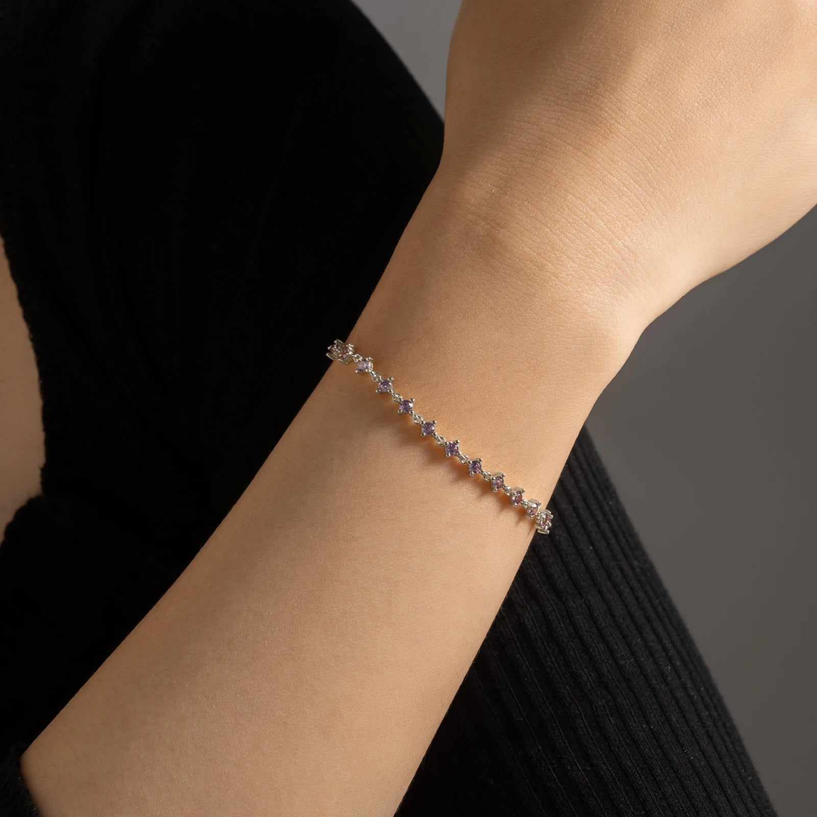 Enhance your style and express your faith with the Lilac Crystal Bracelet. Made with 925 sterling silver and adorned with sparkling Cubic Zirconia stones, this delicate bracelet features a cross design symbolizing love, faith, and unity. Its adjustable chain allows for a perfect fit, making it a meaningful addition to any outfit.

Specifications

Materials: 925 Sterling Silver
Bracelet Thickness: 3mm
Bracelet Type: Chain &amp; Link Bracelets, Chain &amp; Zircon Bracelets
Diameter: 2.5mm
Length (Size): 18cm 