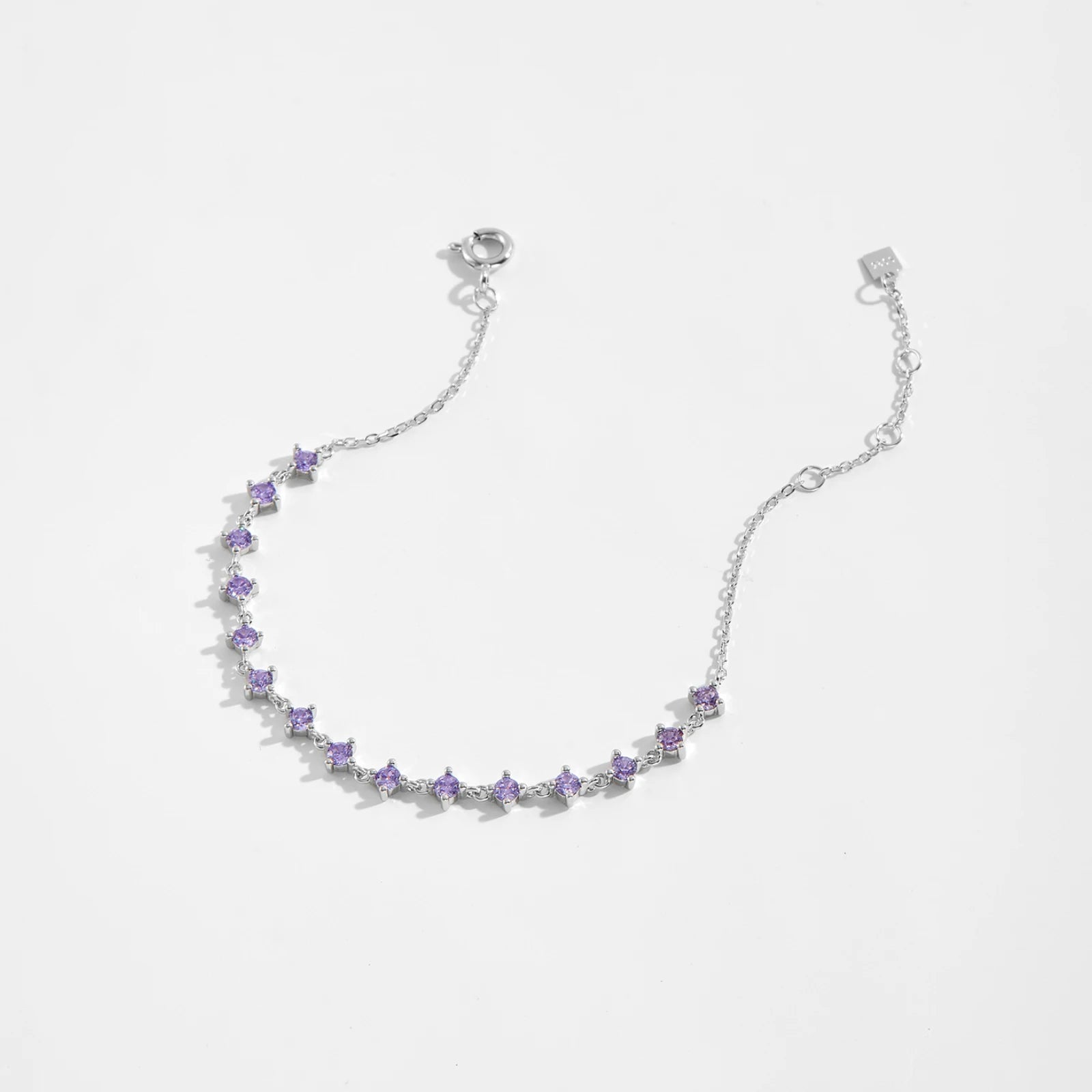 Enhance your style and express your faith with the Lilac Crystal Bracelet. Made with 925 sterling silver and adorned with sparkling Cubic Zirconia stones, this delicate bracelet features a cross design symbolizing love, faith, and unity. Its adjustable chain allows for a perfect fit, making it a meaningful addition to any outfit.

Specifications

Materials: 925 Sterling Silver
Bracelet Thickness: 3mm
Bracelet Type: Chain &amp; Link Bracelets, Chain &amp; Zircon Bracelets
Diameter: 2.5mm
Length (Size): 18cm 