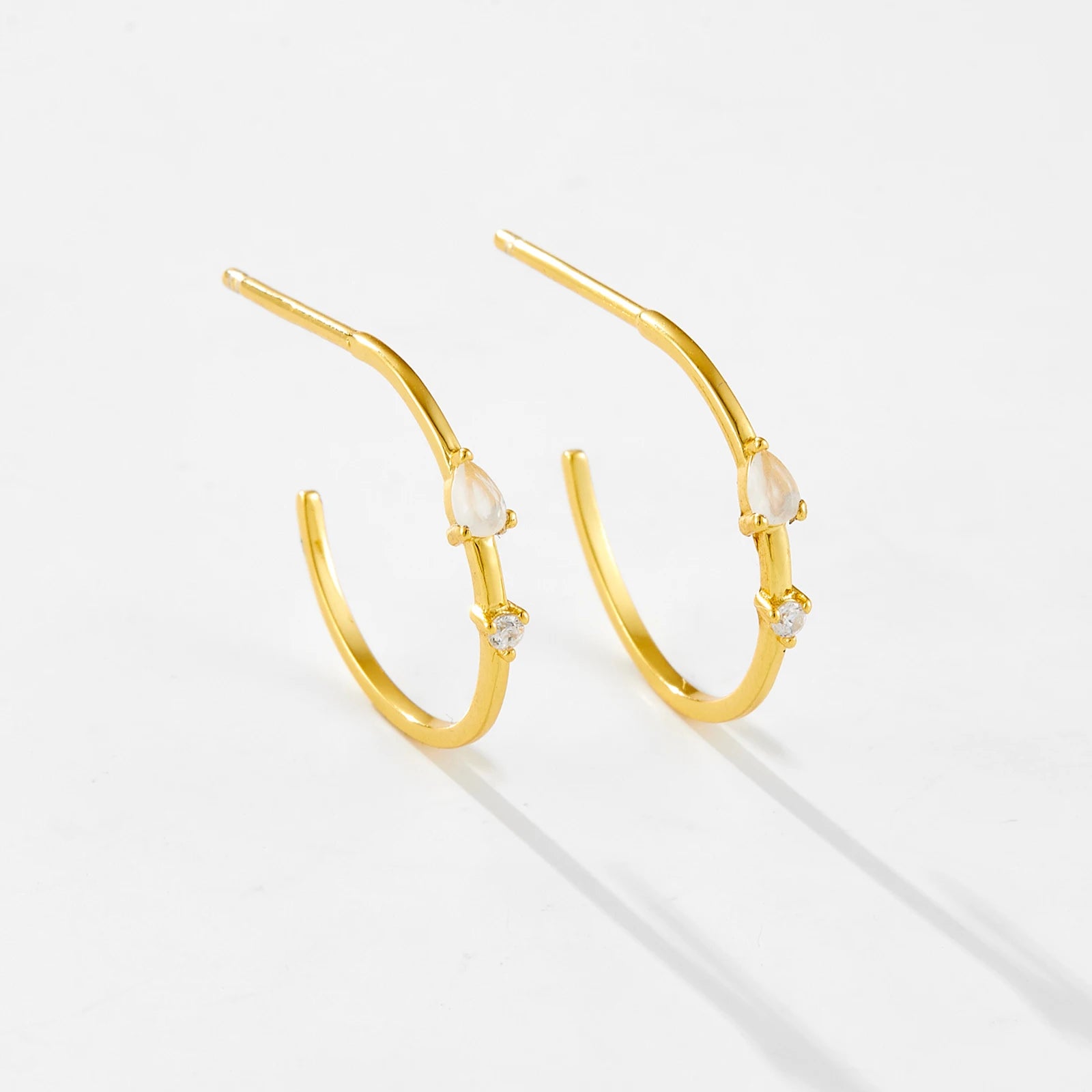 Crafted from 925 Sterling Silver with 14kt Gold Plating, these Blush Hoop Earrings feature Pink Cubic Zirconia stones for a subtle sparkle and touch of elegance. At 15mm diameter, they are perfect for everyday wear or special occasions. Comfortable and stylish, they make a perfect gift or addition to your accessory collection.

Specifications

Material: 925 Sterling Silver with 14kt Gold Plating
Stone Type: AAA Cubic Zirconia
Stone Size: 3.5mm
Earring Type: Hoop Earrings
Diameter: 15mm
Shape: Hoop
Stone Siz